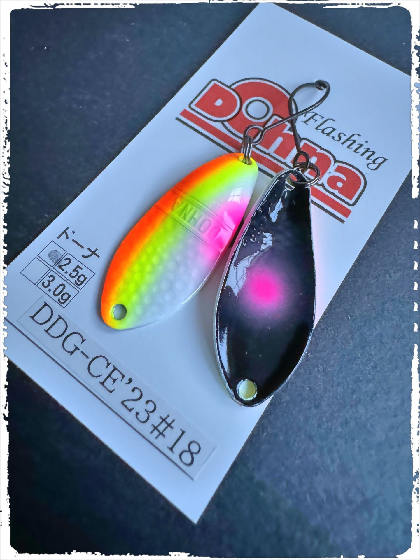 Angler'z System Antem Dohna DDG-CE23 #18 spoon with a sleek design and vibrant colors for fishing enthusiasts.
