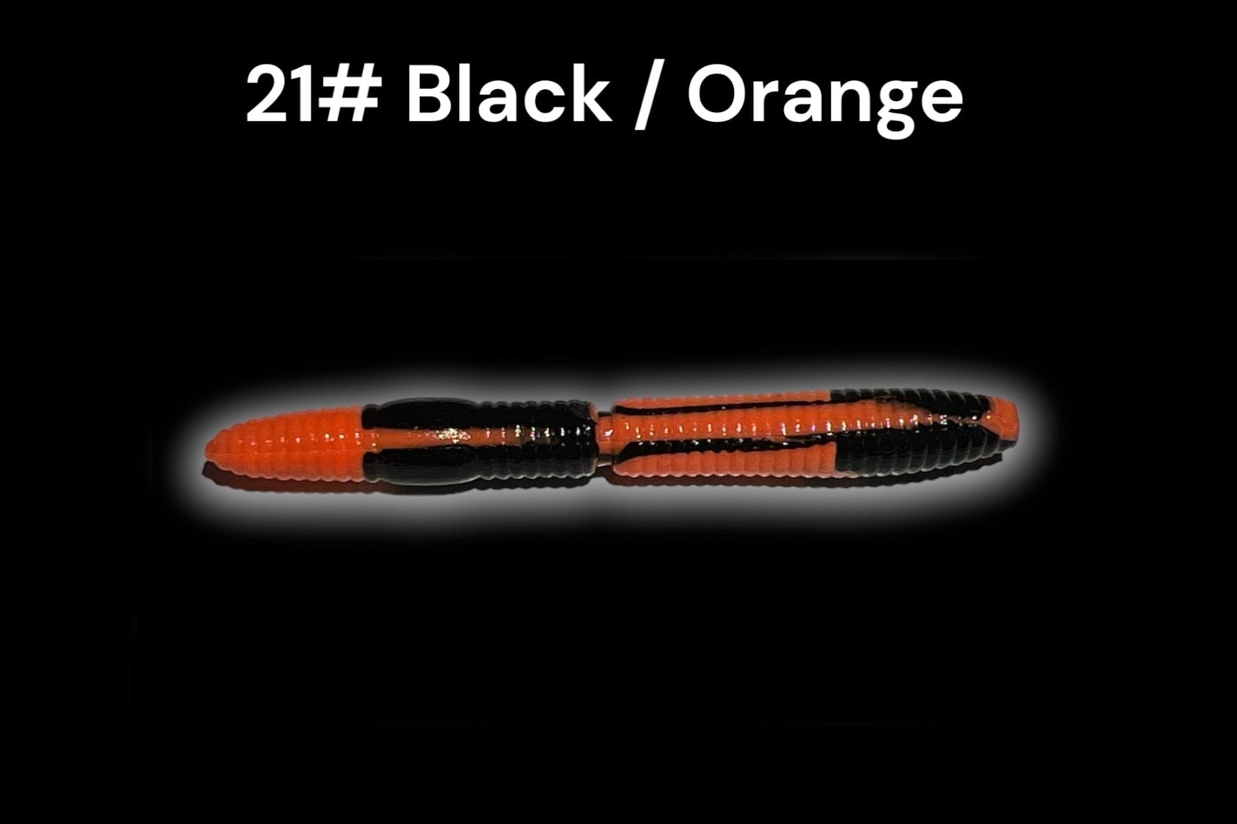 SE-BAITS R-WORM EXTREME FLOATING in black and orange, showcasing the soft plastic fishing lure design and texture.