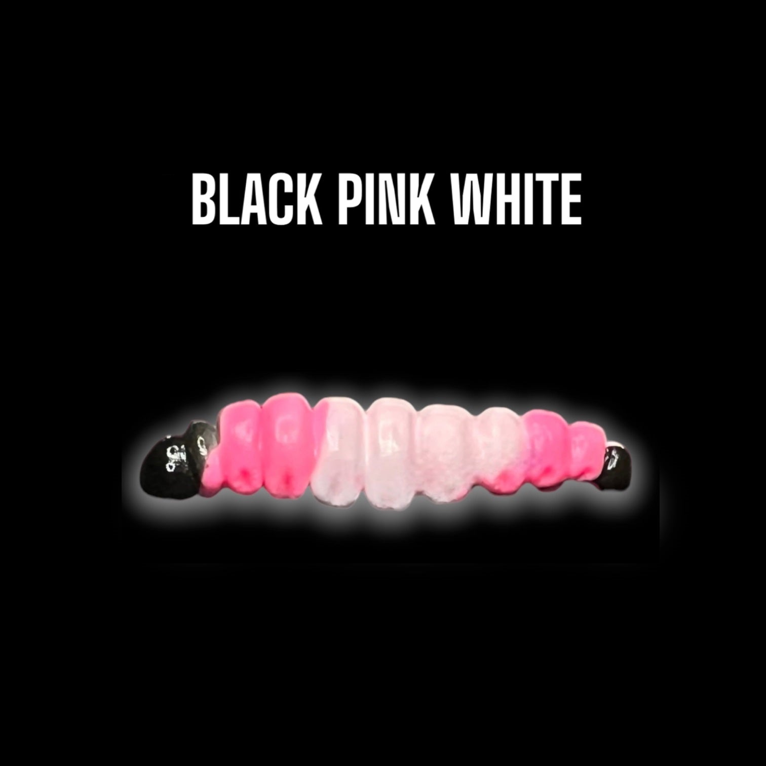 SE-BAITS MG Maggy Extreme Floating gummiköder in black, pink, and white colors on a flat surface.