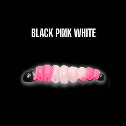 SE-BAITS MG Maggy Extreme Floating gummiköder in black, pink, and white colors on a flat surface.