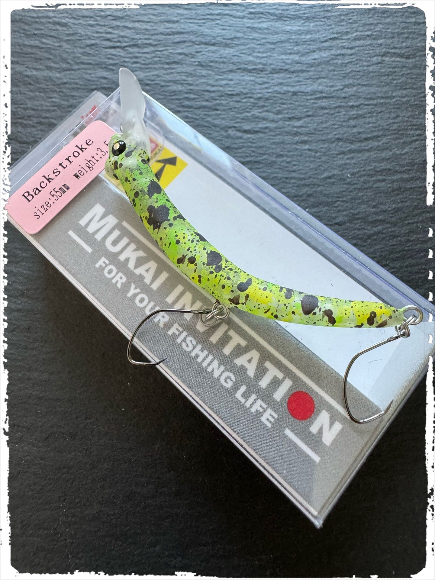 Mukai Backstroke 55 S wobbler in vibrant colors with realistic details for effective fishing.