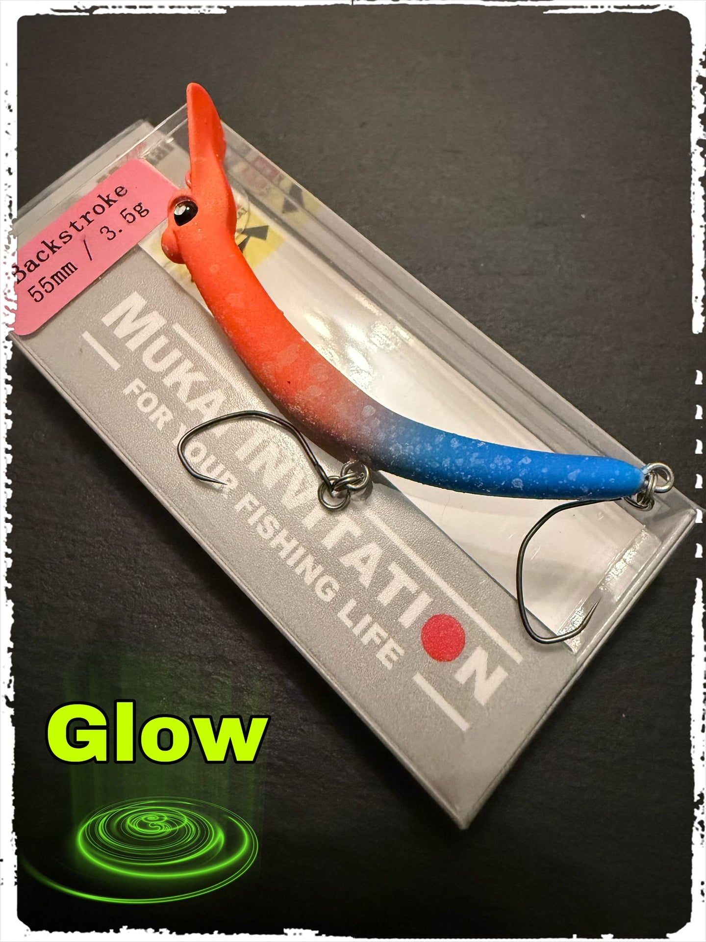 Mukai Backstroke 55 S wobbler in vibrant colors, showcasing its realistic design for effective fishing.