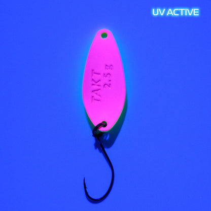 Fangenswert TAKT spoon in EA01 design, showcasing a sleek, ergonomic shape and vibrant color on the back view.