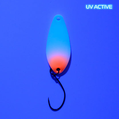 Fangenswert TAKT spoon in EA04 Glow design, showcasing vibrant UV color and sleek shape.